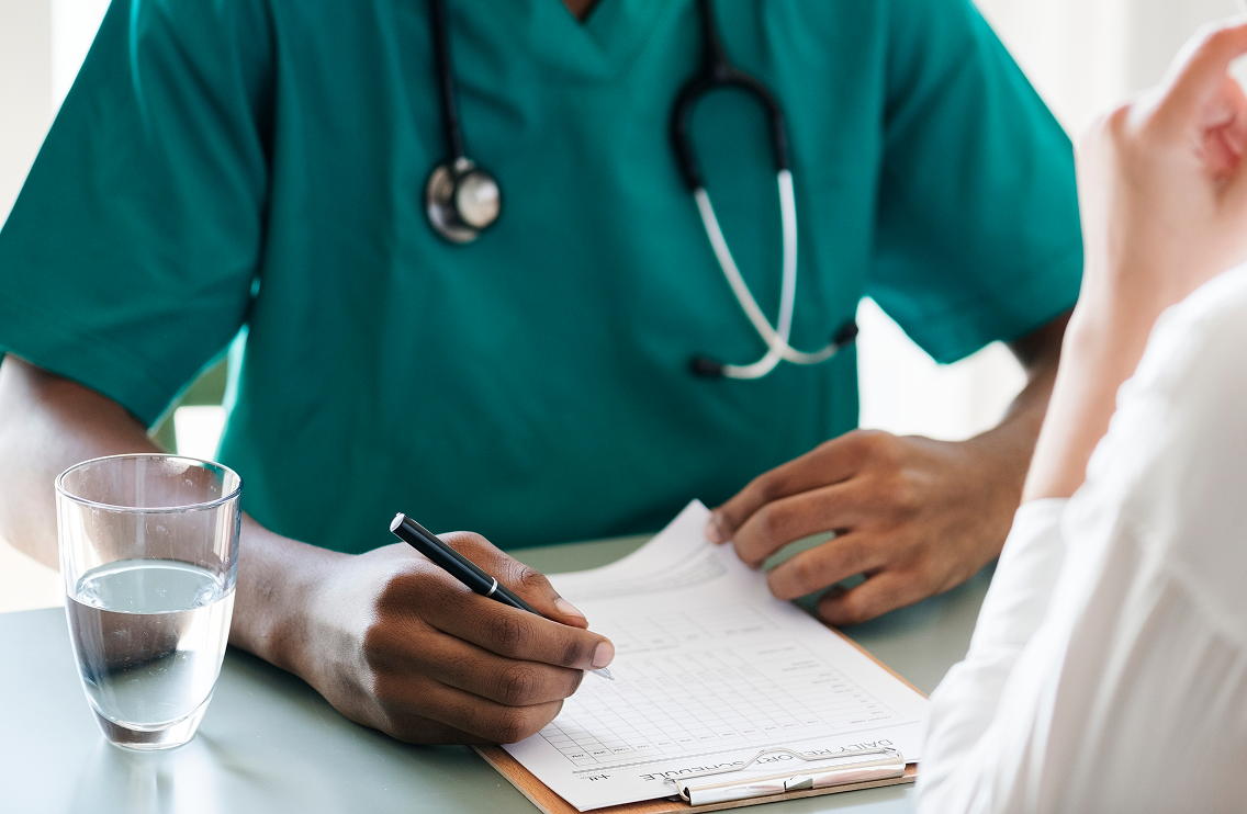 Doctor writing notes